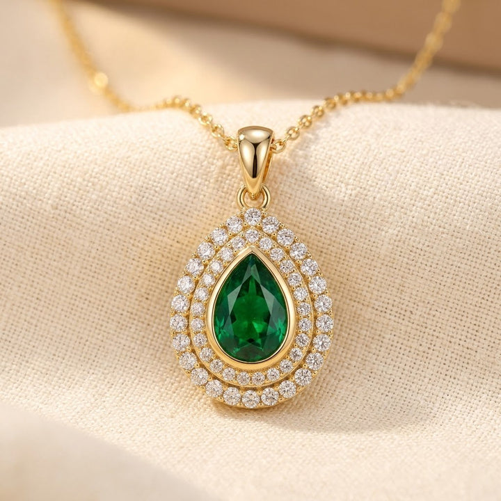 Collier en goutte d'eau en or et émeraude — Doumira