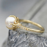 Bague vintage avec perle dorée au centre — Doumira