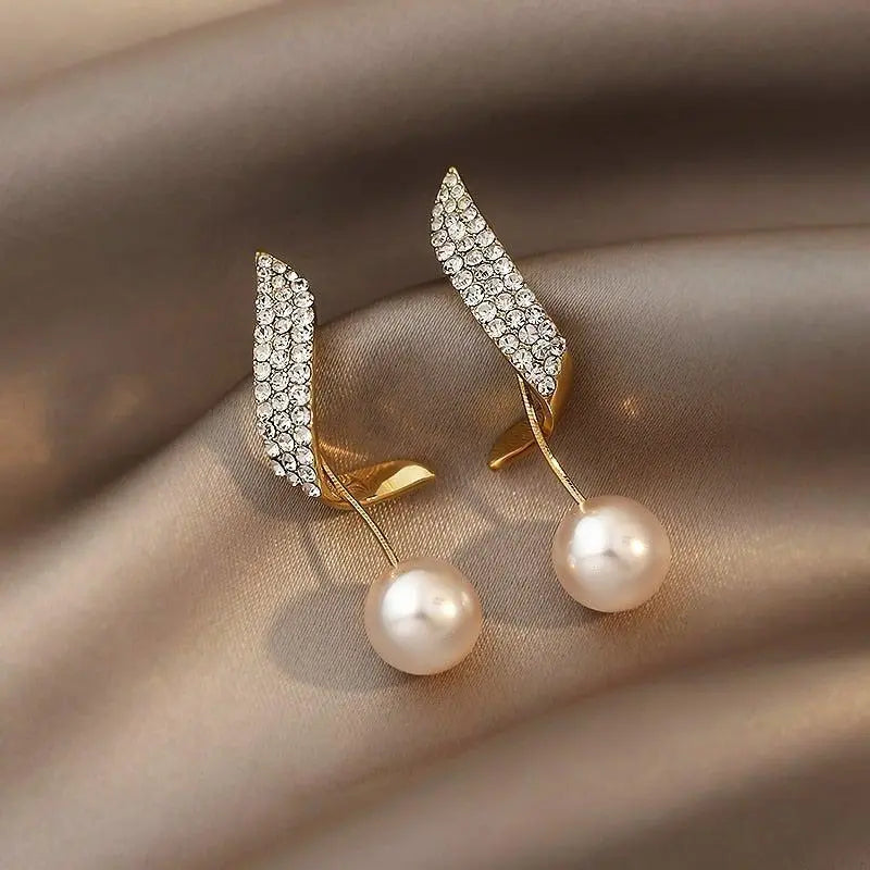 Boucles d'oreilles en or avec perles — Doumira