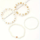 Bracelets en perles blanches — Doumira