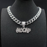 Chaine diamant rappeur — Doumira
