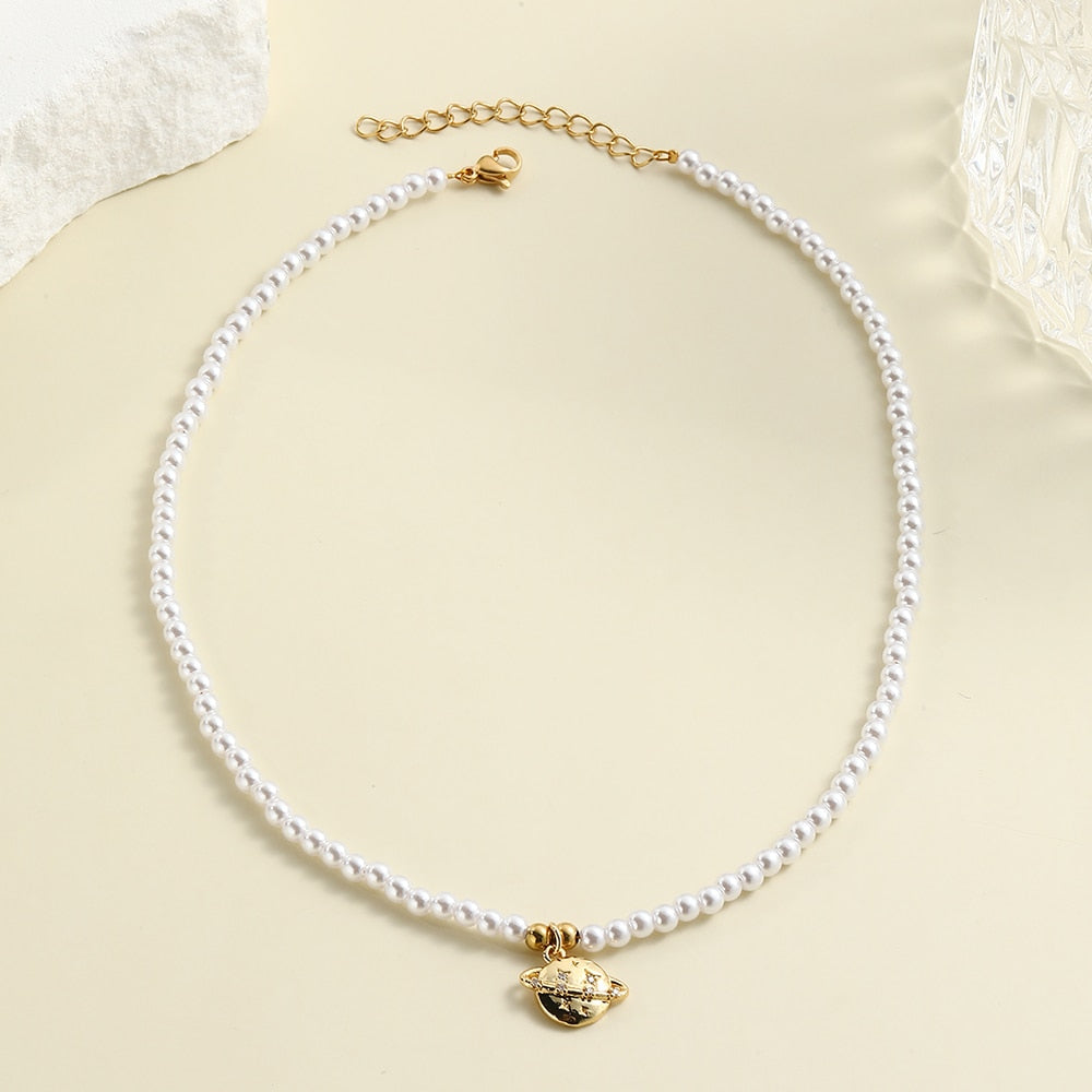 Collier perle planete — Doumira