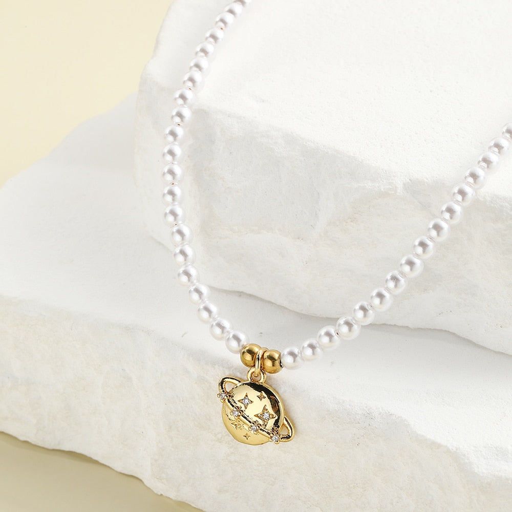 Collier perle planete — Doumira
