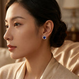 Boucles d'oreilles puces en saphir argenté — Doumira